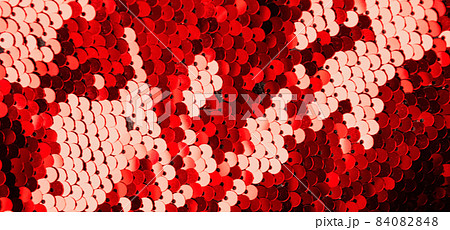 Abstract luxury red background with sequins sequins. Template for modern creative holiday design, new year, party, valentines day 84082848