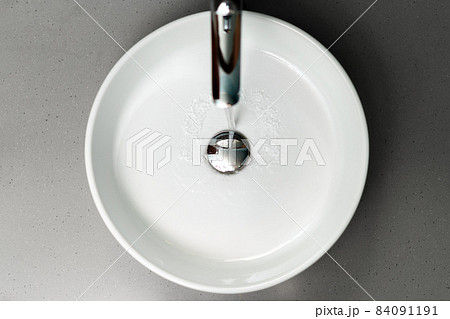 Modern bathroom interior with white ceramic sink Modern bathroom interior with white ceramic sink 84091191