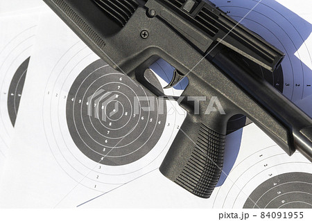 Targets and air rifle barrel. Airgun, pellets and target for shooting 84091955