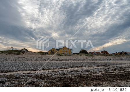 A beautiful dark sky over a beach. Picture from Gilleleje, Denmark A beautiful dark sky over a beach. Picture from Gilleleje, Denmark 84104622