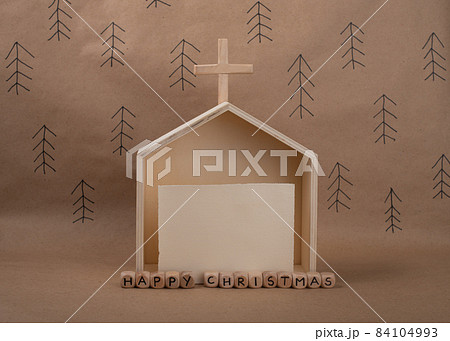 Hand made wooden Church and blank card with space for invitation or greeting. Minimal eco Christmas concept. 84104993