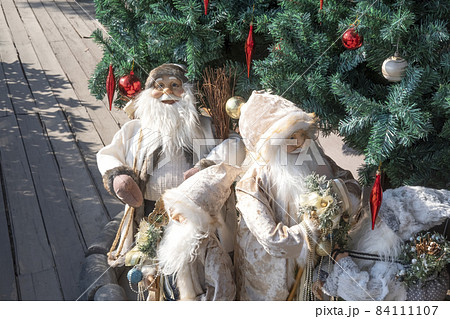 Christmas decorations with santa claus on the wooden floor Christmas decorations with santa claus on the wooden floor 84111107