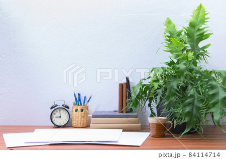 Documents are on the desk at the office Documents are on the desk at the office 84114714
