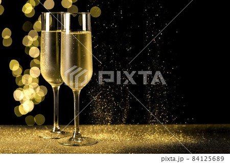 champagne glasses with bokeh lights. High quality beautiful photo concept 84125689