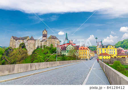 Loket Castle Hrad Loket gothic style building on massive rock, colorful buildings in town Loket Castle Hrad Loket gothic style building on massive rock, colorful buildings in town 84128412