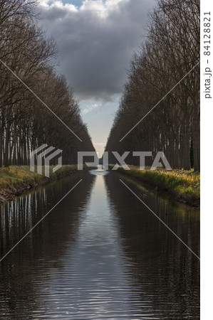 Colorful reflections at the canal near Bruges Colorful reflections at the canal near Bruges 84128821