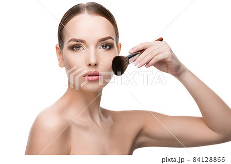 Beautiful Young Woman with Clean Fresh Skin isolated on white background Beautiful Young Woman with Clean Fresh Skin isolated on white background 84128866