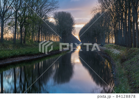Colorful reflections at the canal near Bruges Colorful reflections at the canal near Bruges 84128878