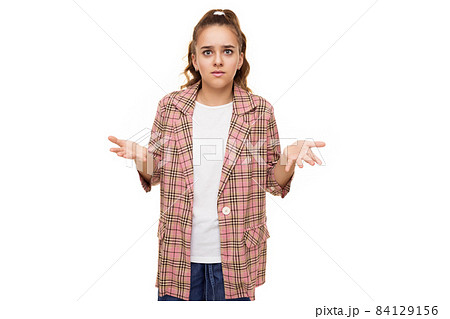 Photo of beautiful amazing cute adorable asking angry brunette teenage girl with ponytail in stylish 84129156