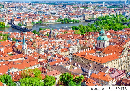 Top aerial view of Prague historical city centre with red tiled roof buildings 84129458