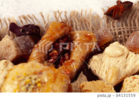 Assortment of turkish desserts baklava and halva Assortment of turkish desserts baklava and halva 84131559