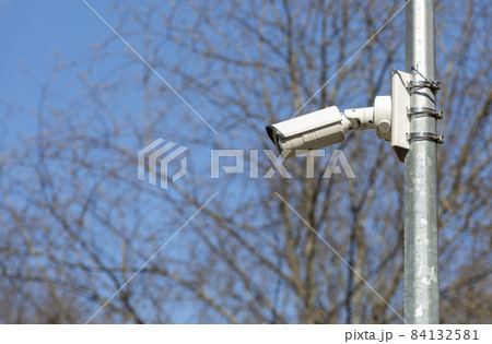 Security surveillance camera near forest. Security. Safe life concept. 84132581