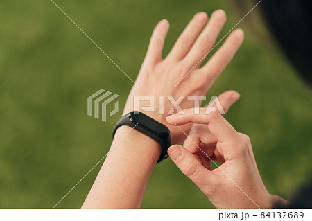 Girl Checking Her Heart Rate On Smart Watch After Gymnastic Exercises. 84132689