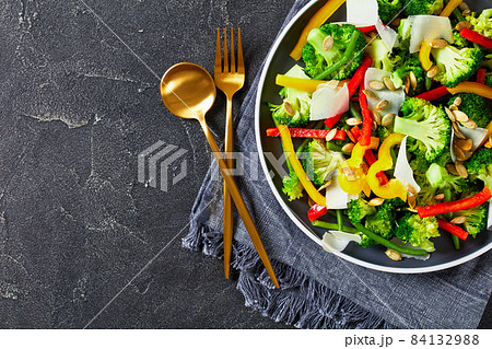 broccoli sweet pepper green beans salad on a plate 84132988