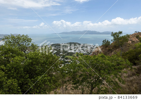 Mountaintop View Across The City To The Sea 84133669