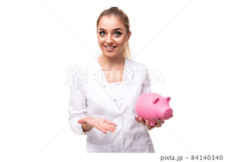 Photo of a beautiful pretty attractive positive smiling young blonde woman with a ponytail and 84140340