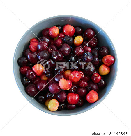 cherry in a cup on a white background cherry in a cup on a white background 84142343