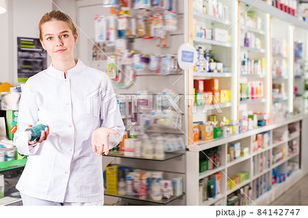 Diligent positive female druggist Diligent positive female druggist 84142747