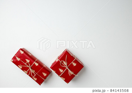 Red gift boxes on white background top view 84143508