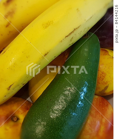 still life of nectanine plums of bananas avocado 84144216