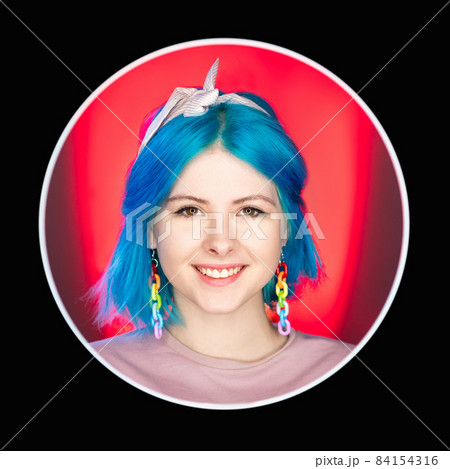 Smiling woman portrait. Positive emotion. Optimistic attitude. Happy attractive girl face isolated on red background in round black avatar icon frame. 84154316