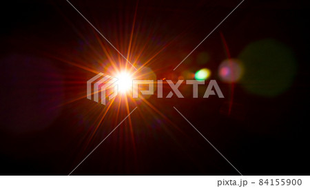 Sun flare on the black background 84155900