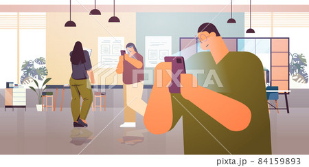 addicted businesspeople using digital gadgets business people active in social networks digital addiction concept 84159893