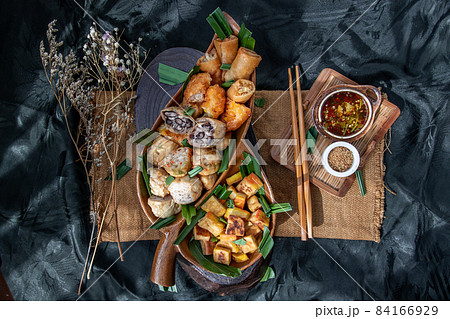 Fried taro rolls and Deep fried spring rolls, Fried tofu, Fried radish, Fried taro and black beans. 84166929