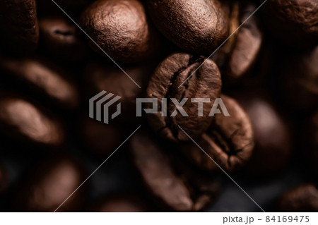 Coffee beans background, roasted signature bean with rich flavour, best morning drink and luxury blend 84169475