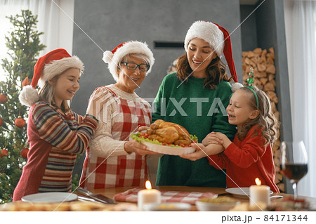 family celebrating Christmas family celebrating Christmas 84171344