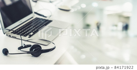 Headset and customer support equipment at call center ready for actively service Headset and customer support equipment at call center ready for actively service 84171922