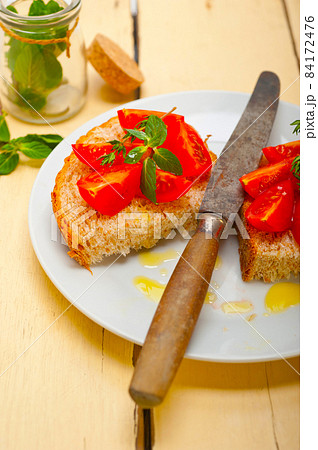 Italian tomato bruschetta Italian tomato bruschetta 84172476
