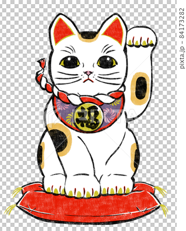 A calico beckoning cat sitting on a cushion and raising his left leg. 84173282