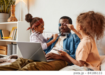 Two Girls doing Fathers Makeup Two Girls doing Fathers Makeup 84186133