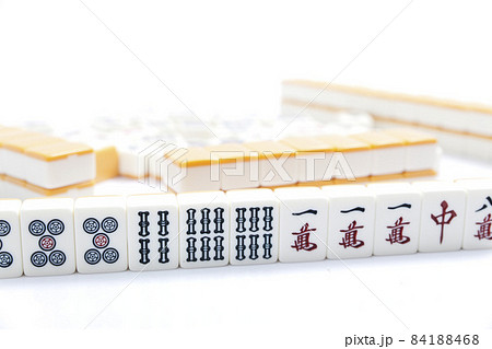 Mahjong game on white table, close up. 84188468