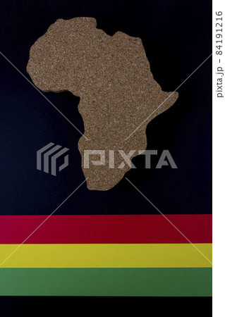 Black History Month concept. Africa Continent shape with traditional red, yellow and green color bar.  84191216