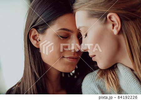 Diverse friends girls lesbian couple hugging. Stylish cool generation z women dating in love enjoy romantic relationships Diverse friends girls lesbian couple hugging. Stylish cool generation z women dating in love enjoy romantic relationships 84192226