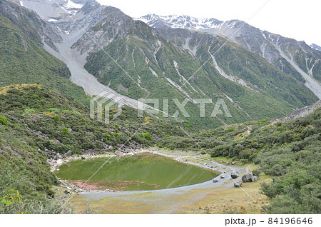 View of Tasman Lake taken from a mountain peake, which is at the terminal of Tasman Glacier, which is the longest glacier in New Zealand. View of Tasman Lake taken from a mountain peake, which is at the terminal of Tasman Glacier, which is the longest glacier in New Zealand. 84196646