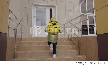 small child with backpack rushes to school for lesson, kid with school bag on his shoulders runs to the classroom, children's primary preschool education, happy family, additional student activities small child with backpack rushes to school for lesson, kid with school bag on his shoulders runs to the classroom, children's primary preschool education, happy family, additional student activities 84201264