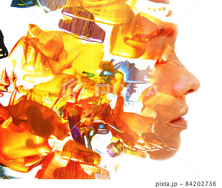 A profile portrait of a beautiful European girl combined with an abstract digital graphic in a double exposure technique A profile portrait of a beautiful European girl combined with an abstract digital graphic in a double exposure technique 84202736