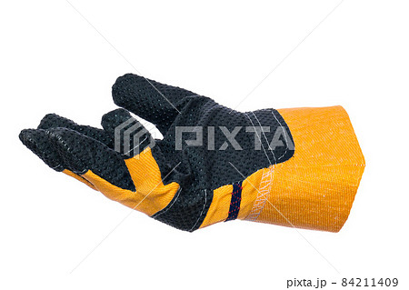 This is kind of one construction glove insulated on white background. Yellow crag with palm up This is kind of one construction glove insulated on white background. Yellow crag with palm up 84211409