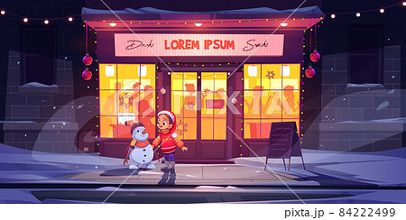 Little girl and snowman at winter bar, Christmas 84222499