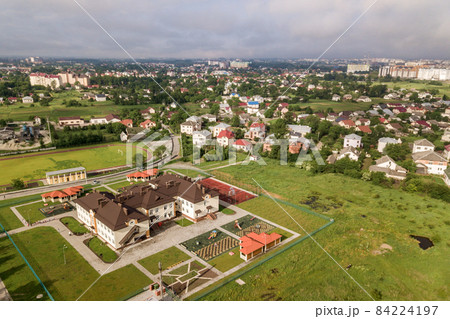Aerial view of new prescool building in residential rural area. 84224197