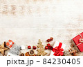 Christmas background with gift boxes on wooden table 84230405