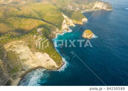 Aerial view on tropical coast Kelingking Beach with turquoise sea in Nusa Penida island, Bali 84230589