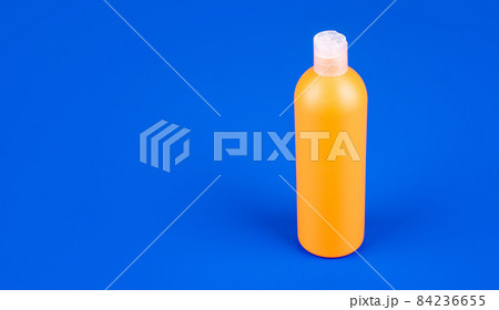 presenting cosmetic product. unbranded shampoo advertisement. presenting cosmetic product. unbranded shampoo advertisement. 84236655