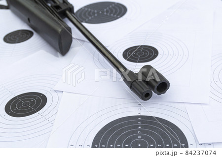 Targets and air rifle barrel. Airgun, pellets and target for shooting Targets and air rifle barrel. Airgun, pellets and target for shooting 84237074