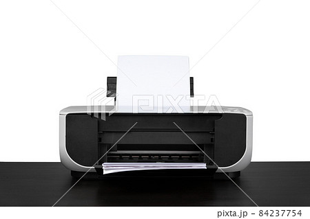 Laser home printer on table against white backgorund Laser home printer on table against white backgorund 84237754