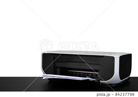 Laser home printer on table against white backgorund 84237796