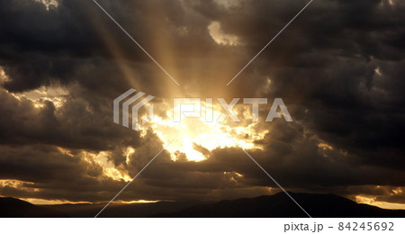 Sky window, golden sunset, cloudscape. High quality photo. 84245692